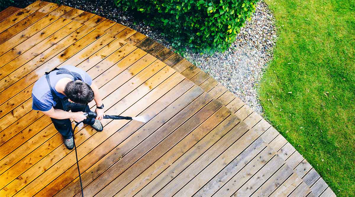 How to Clean a Deck Without Damaging It (Tips from a Soft Wash Expert)
